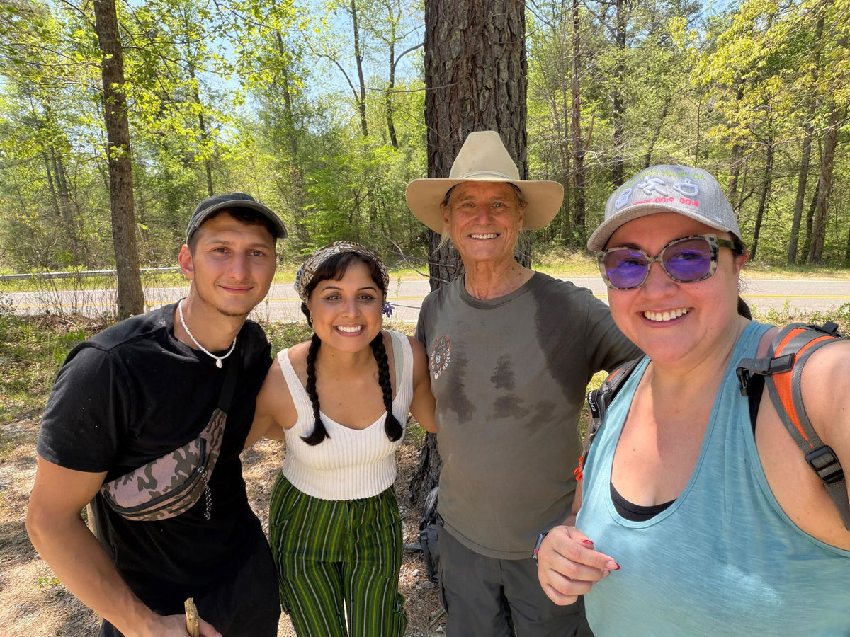 Group of guests with their Wyldforest guide on a mushroom tour near Asheville